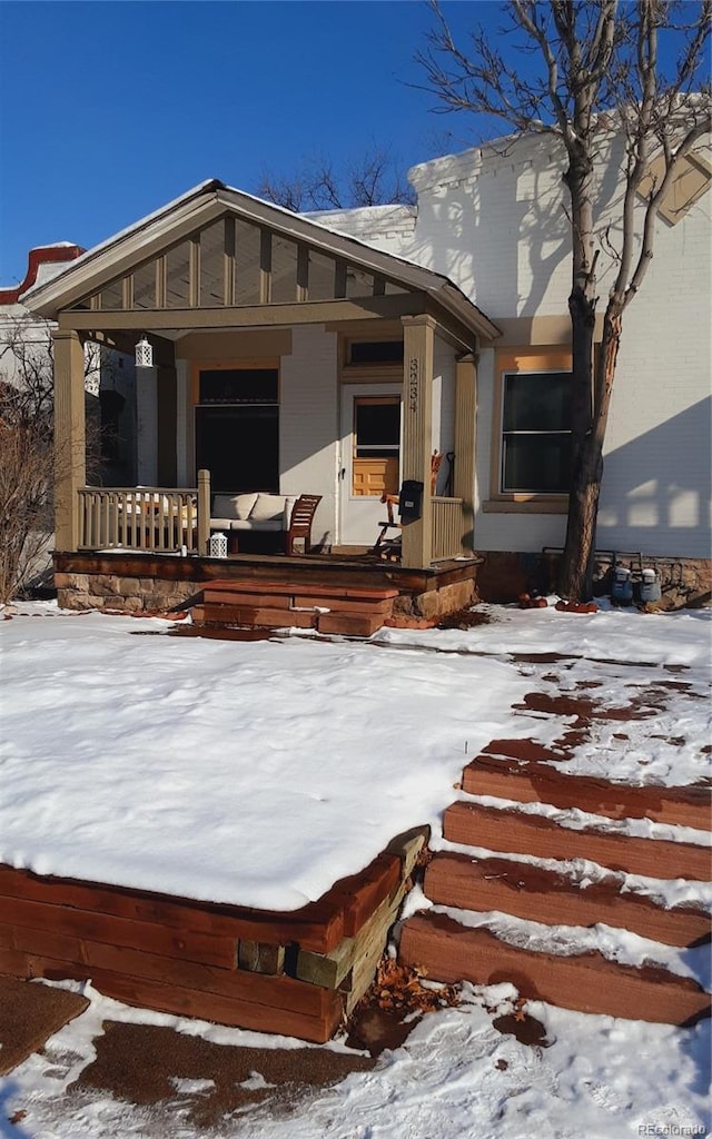 view of front of house featuring covered porch