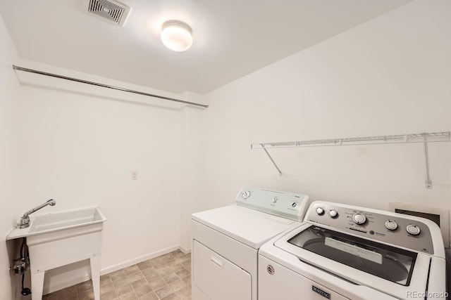 laundry area featuring separate washer and dryer