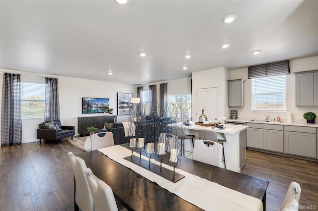 11782 Foraker Ln, Colorado Springs, CO 80925 - dining space with dark wood-style floors and recessed lighting