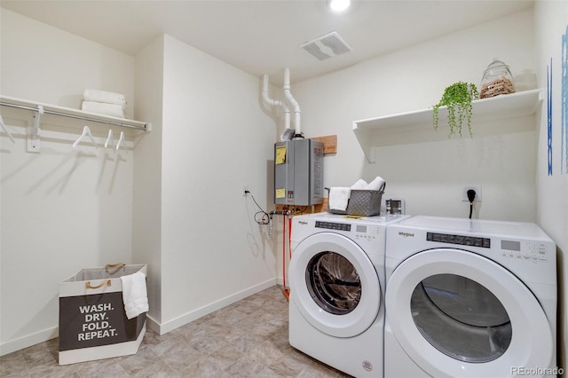 11782 Foraker Ln, Colorado Springs, CO 80925 - laundry room with washer and dryer and water heater