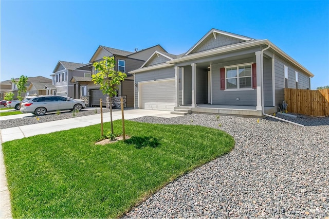 13487 Valentia St, Thornton, CO 80602 - view of front facade featuring a porch, concrete driveway, an attached garage, and a residential view