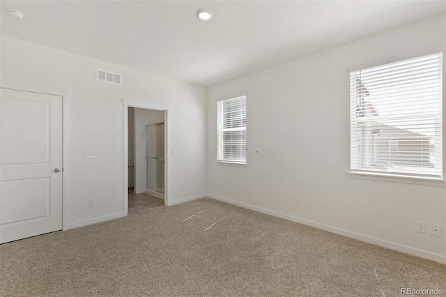 13487 Valentia St, Thornton, CO 80602 - carpeted spare room featuring baseboards and a smoke detector
