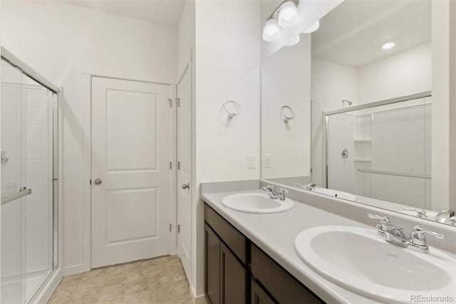 13487 Valentia St, Thornton, CO 80602 - full bath featuring a shower stall and double vanity