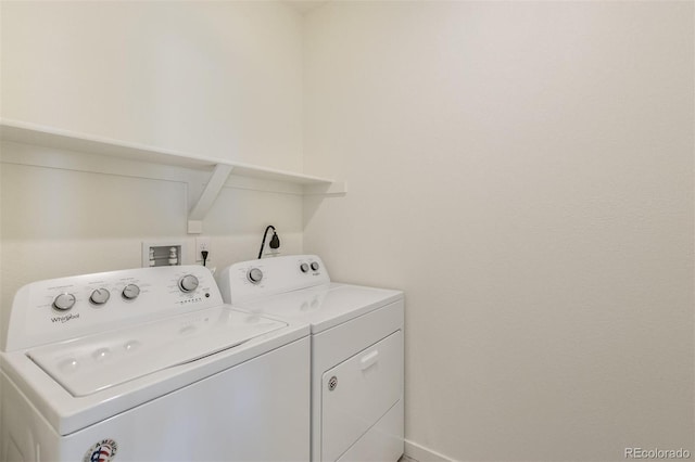 13487 Valentia St, Thornton, CO 80602 - laundry room with washer and dryer and baseboards