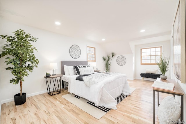 bedroom with light hardwood / wood-style flooring