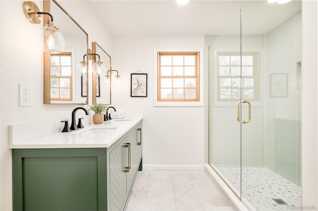 bathroom with vanity and an enclosed shower