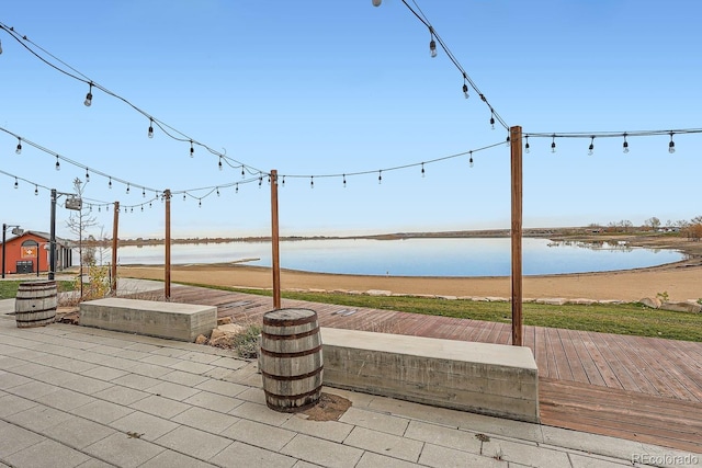 view of patio featuring a water view