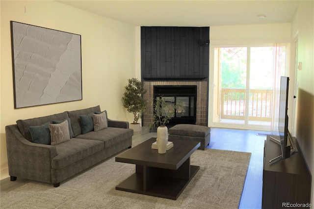 14780 E Kentucky Dr Unit 414, Aurora, CO 80012 - living room featuring a brick fireplace