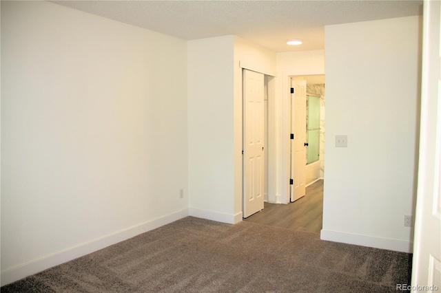 14780 E Kentucky Dr Unit 414, Aurora, CO 80012 - carpeted empty room featuring baseboards