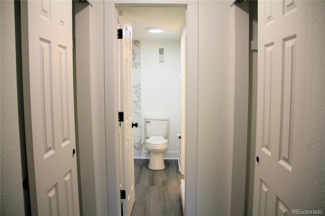 14780 E Kentucky Dr Unit 414, Aurora, CO 80012 - hallway featuring dark wood-style flooring
