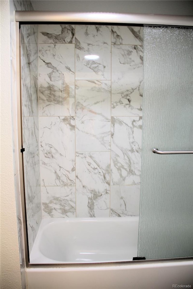 14780 E Kentucky Dr Unit 414, Aurora, CO 80012 - bathroom with washtub / shower combination