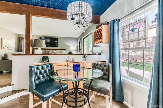 10360 Irving Ct, Westminster, CO 80031 - dining area with wood finished floors and a chandelier