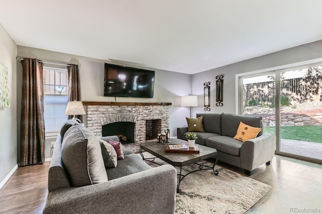 10360 Irving Ct, Westminster, CO 80031 - living area with wood finished floors and a fireplace
