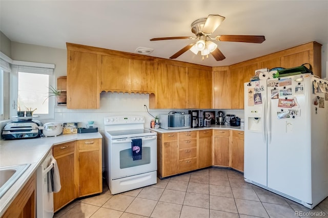 6095 W 47th Ave, Wheat Ridge, CO 80033 - kitchen with white appliances, light countertops, light tile patterned floors, a ceiling fan, and decorative backsplash