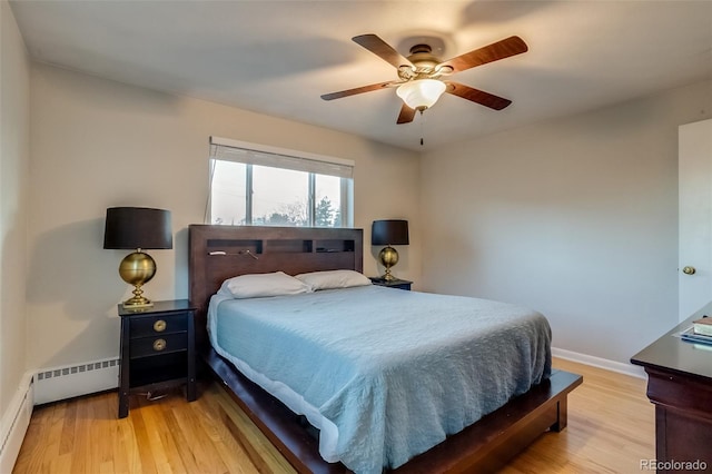 6095 W 47th Ave, Wheat Ridge, CO 80033 - bedroom featuring light wood finished floors, baseboards, and ceiling fan