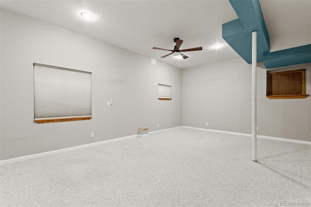 unfurnished room with carpet flooring and ceiling fan