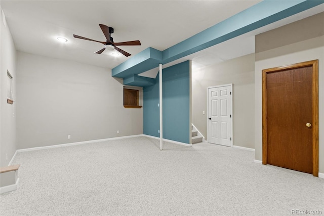 interior space with carpet floors, ceiling fan, and a closet