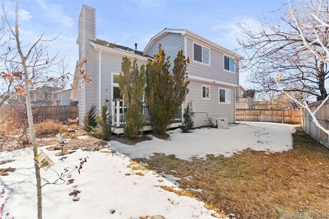 view of snow covered property