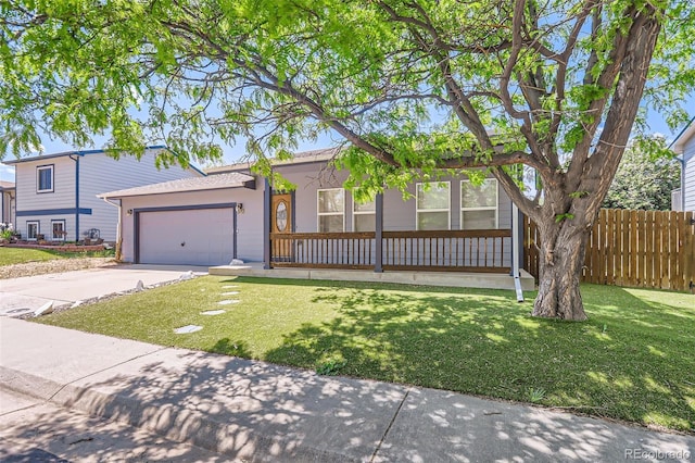 single story home featuring concrete driveway and an attached garage
