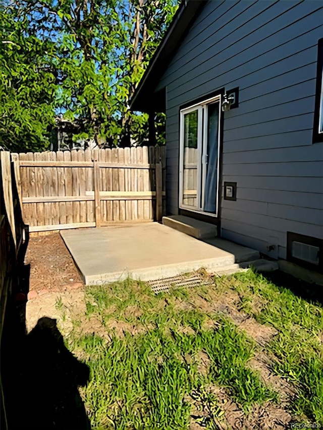 view of patio with fence