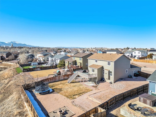 exterior space with a residential view and a mountain view