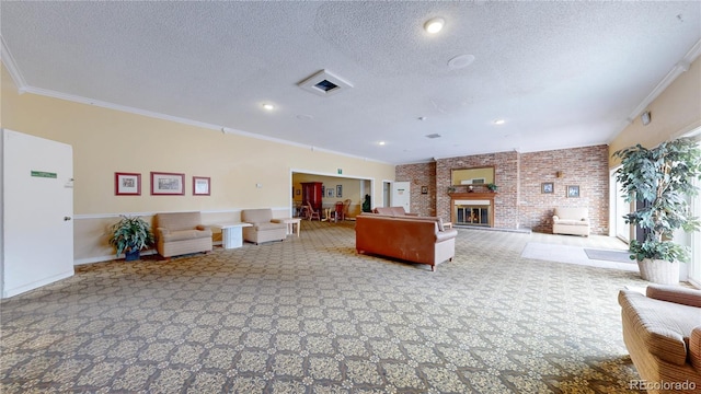 unfurnished living room featuring ornamental molding, carpet, and a fireplace