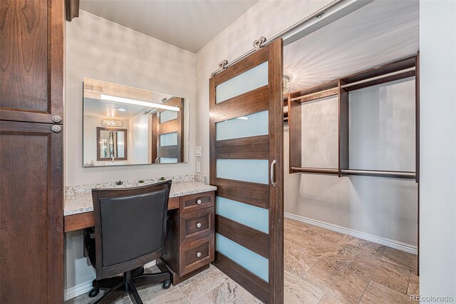 1551 Larimer St Unit 2602, Denver, CO 80202 - bathroom with baseboards and vanity