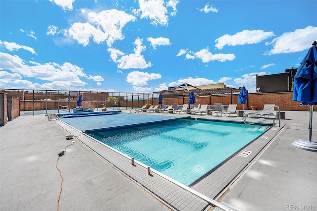 1551 Larimer St Unit 2602, Denver, CO 80202 - community pool featuring a patio and fence