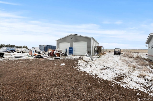 exterior space featuring a garage