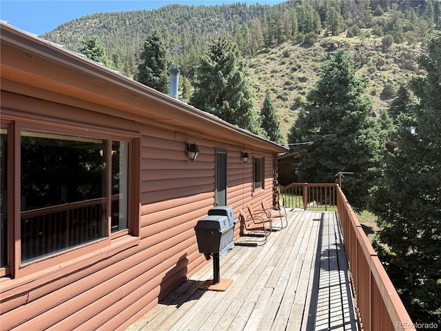 36 Woodchuck Dr, South Fork, CO 81154 - deck with a forest view and a mountain view