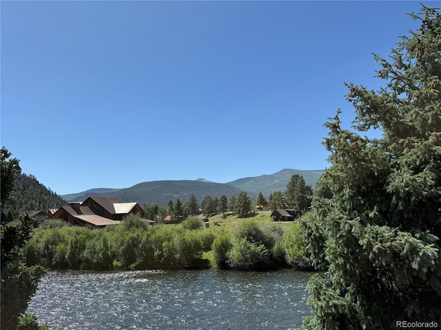 36 Woodchuck Dr, South Fork, CO 81154 - view of mountain background featuring a nearby body of water
