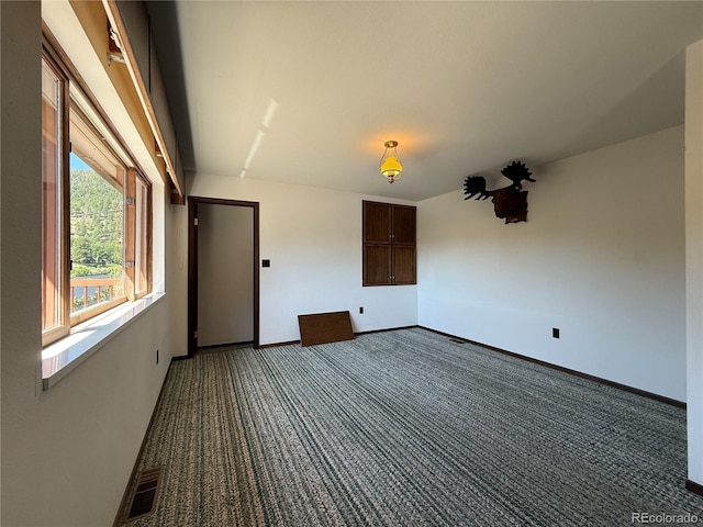 36 Woodchuck Dr, South Fork, CO 81154 - unfurnished room featuring dark carpet and baseboards