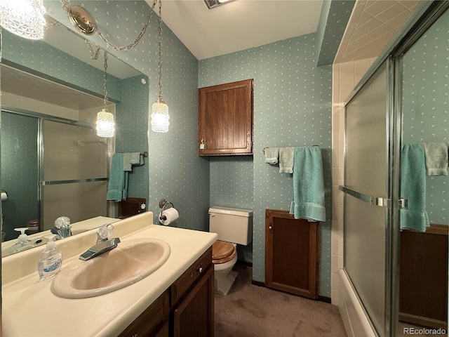 36 Woodchuck Dr, South Fork, CO 81154 - bathroom featuring vanity, bath / shower combo with glass door, and wallpapered walls