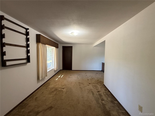 36 Woodchuck Dr, South Fork, CO 81154 - hallway featuring carpet and a textured ceiling