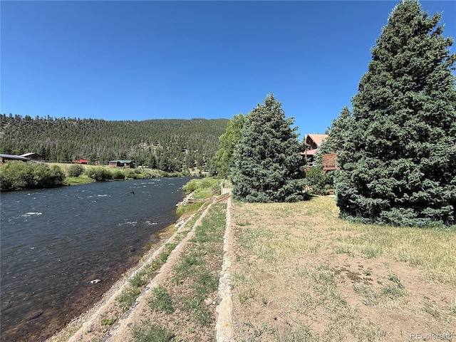 36 Woodchuck Dr, South Fork, CO 81154 - view of street with a water view and a forest view