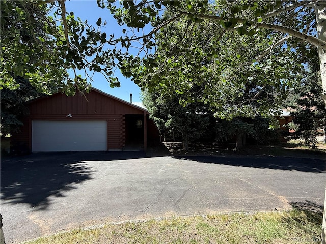 36 Woodchuck Dr, South Fork, CO 81154 - view of home's exterior with asphalt driveway and an attached garage
