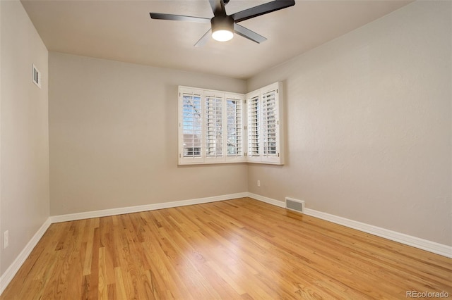 unfurnished room with ceiling fan and light hardwood / wood-style floors