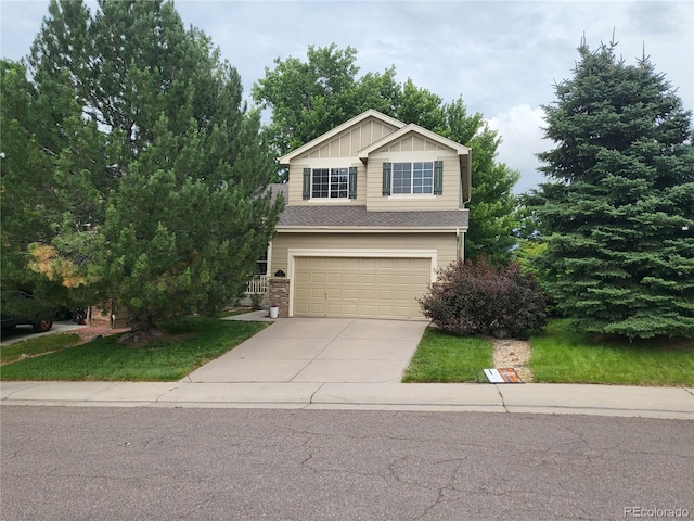 10386 Ravenswood Way, Highlands Ranch, CO 80130 - view of front of home with driveway and an attached garage