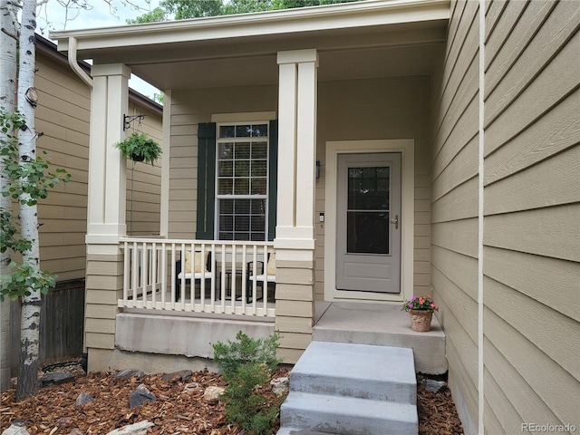 10386 Ravenswood Way, Highlands Ranch, CO 80130 - property entrance featuring covered porch
