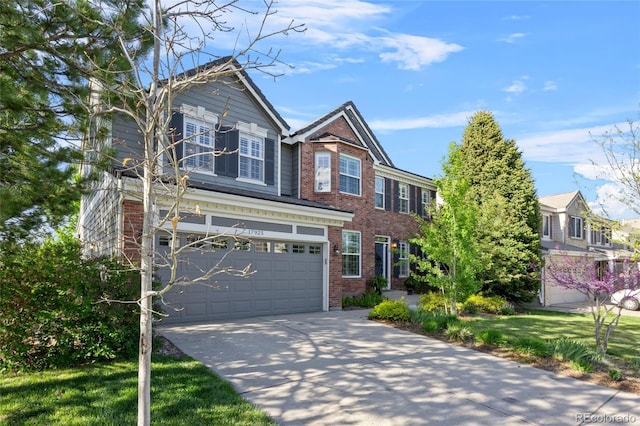 view of front of house with concrete driveway, brick siding, and a garage