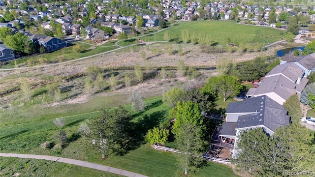aerial overview of property's location with nearby suburban area