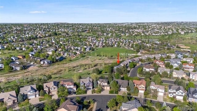 aerial overview of property's location featuring nearby suburban area