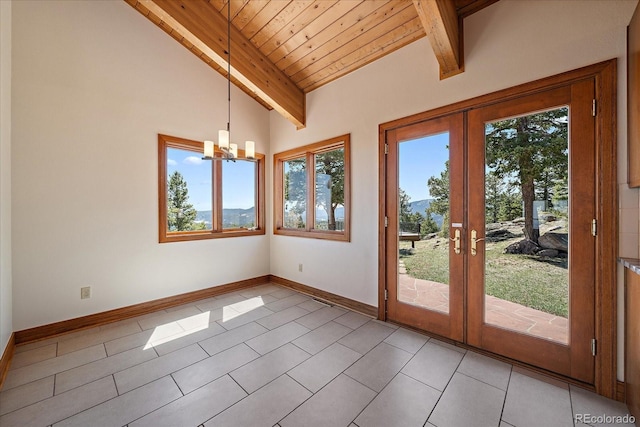 5197 Bear Mountain Dr, Evergreen, CO 80439 - doorway to outside with a notable chandelier, french doors, wooden ceiling, and plenty of natural light
