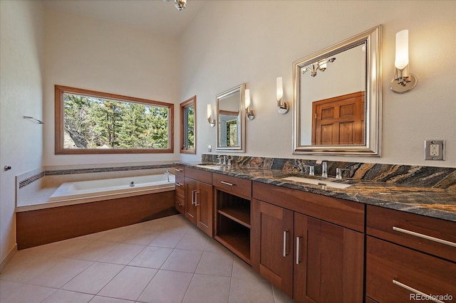 5197 Bear Mountain Dr, Evergreen, CO 80439 - full bathroom featuring a bath, tile patterned floors, double vanity, and a sink