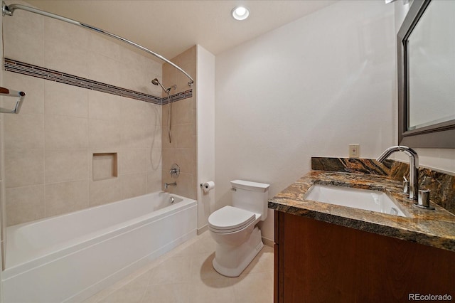 5197 Bear Mountain Dr, Evergreen, CO 80439 - bathroom featuring toilet, shower / washtub combination, tile patterned floors, baseboards, and vanity