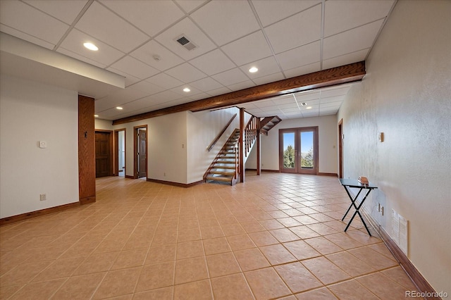 5197 Bear Mountain Dr, Evergreen, CO 80439 - basement with baseboards, stairway, visible vents, and light tile patterned flooring