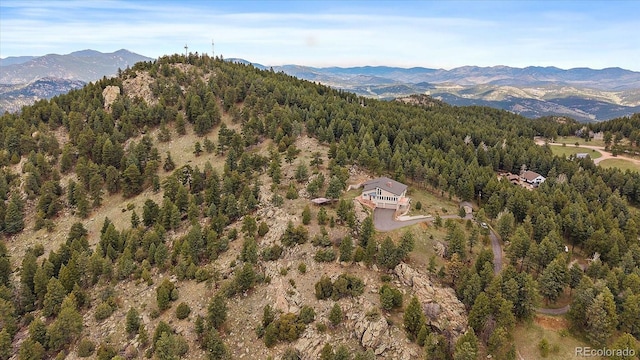5197 Bear Mountain Dr, Evergreen, CO 80439 - birds eye view of property with a forest view and a mountain view