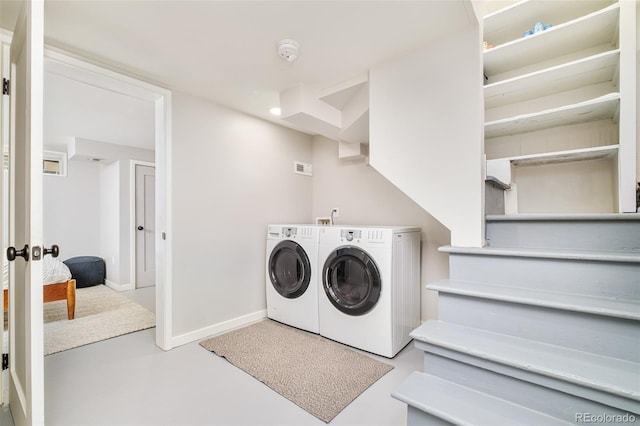 2228 N Race St, Denver, CO 80205 - laundry room featuring washing machine and dryer and baseboards