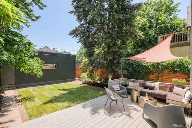 2228 N Race St, Denver, CO 80205 - wooden terrace with outdoor lounge area and a fenced backyard