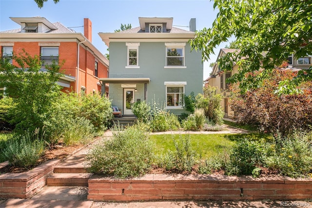 2228 N Race St, Denver, CO 80205 - traditional style home featuring stucco siding and brick siding
